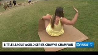 Mackenzie Aucker attempts to slide down legendary Lamade Stadium hill