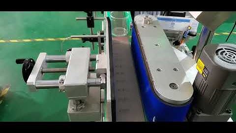 cone glass cup candle jar cup conic and round cup labeling machine test video.mp4