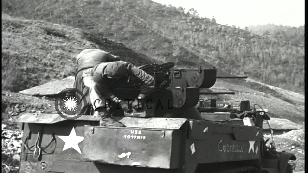 Soldiers fires Quad .50 Caliber Machine Gun targeting on hill and M4