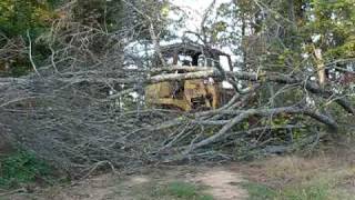 Case 1550 Dozer - Pushing downed tree off the road.