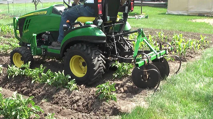 #8 John Deere 1025R Hilling Potatoes & Corn with D...