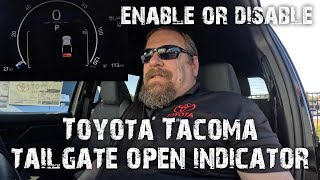 Enable or disable the Toyota Tacoma tailgate open alert