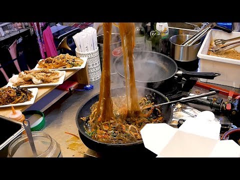 Thumbnail for Glass noodles stir-fried with vegetables (Japchae) - Korean street food