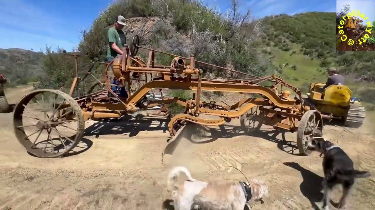 Tow grader fixing roads with D2 