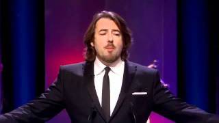 Jonathon Ross starts the show and takes the micke out of Ricky Gervais and Simon Amstell