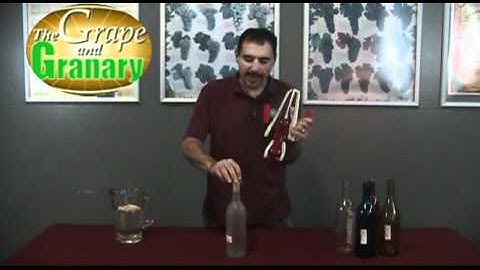 Using a Portuguese Hand Corker at the Grape and Granary- www.grapeandgranary.com