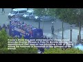 The France team arrives to the Champs Elysées for victory parade