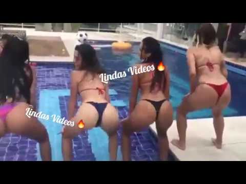 Grupo de amigas bailando bien rico en día de piscina