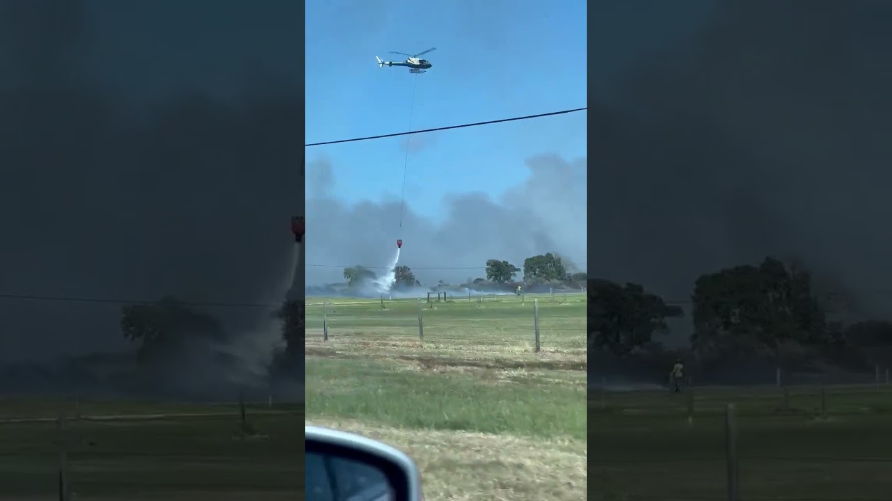 Firefighting crew dumps water on marsh fire near Sabine Pass. Video credit: viewer, Brittany C.