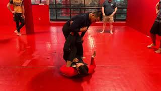 Single leg X transition to X guard sweep