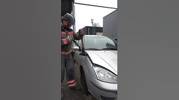 Lifting car hood with Forcible Entry Tool T1