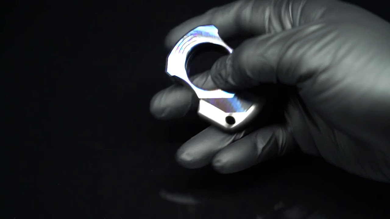 The MTAK V.2 knuckle duster in zirconium w/ zircuti