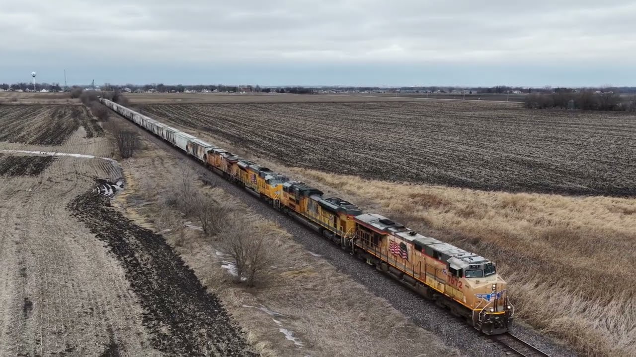 Drone video of long southbound Union Pacific mixed freight on the Spine Line