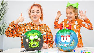 Ruby and Bonnie paint and decorate their pumpkins