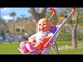 A new STROLLER for baby dolls! Baby Annabell doll is crying! Baby Reborn doll goes for a walk.