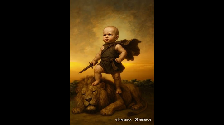 a brave baby stand on a lion