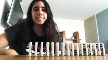 Simulating uniform linear motion using dominoes