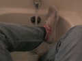 Wet Keds and jeans in the tub
