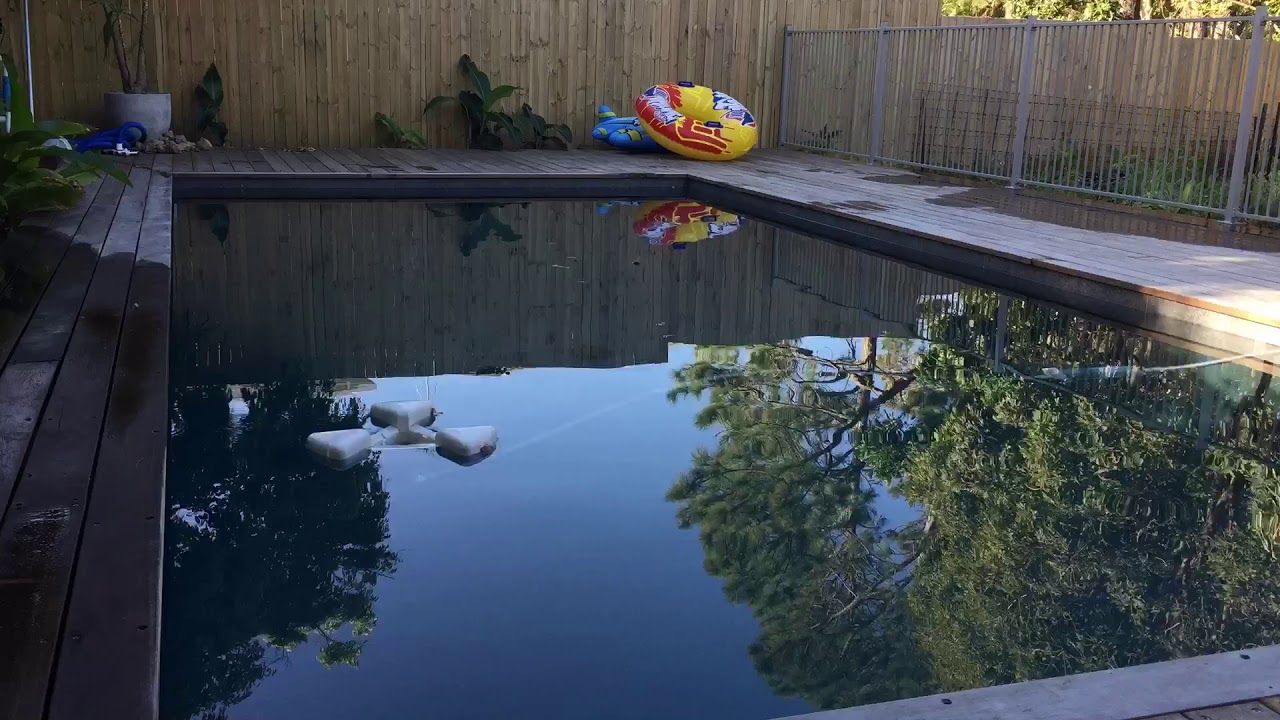 A pool cleaner that cleans the surface 