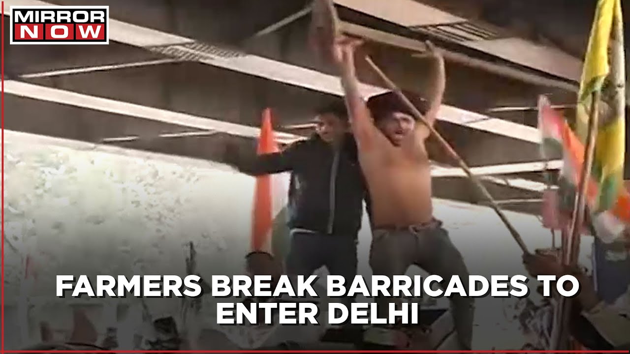 Farmers clash with cops, break barricades to enter Delhi; Police resort to lathicharge & tear gases