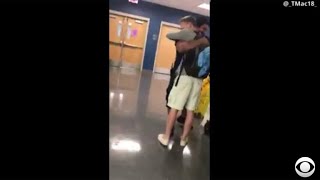 Teenage boy surprises school's custodian with new sneakers