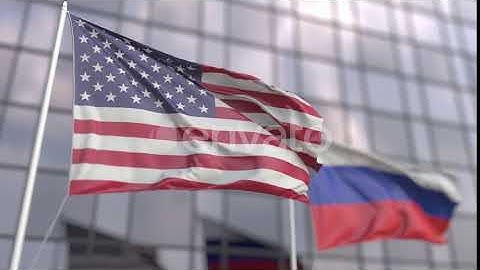 Flags of the USA and Russia in Front of a Skyscraper | Motion Graphics - Envato elements