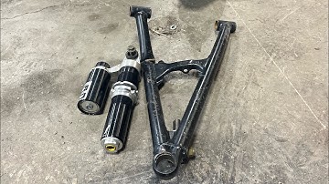 How to Replace a Bottom A-arm on a Polaris Snowmobile