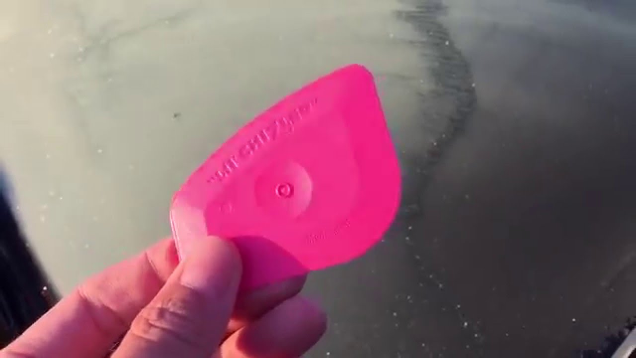 Lil' Chilzler sign tool working as an compact windshield scraper