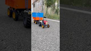 Rc tractor with sugarcane trolley
