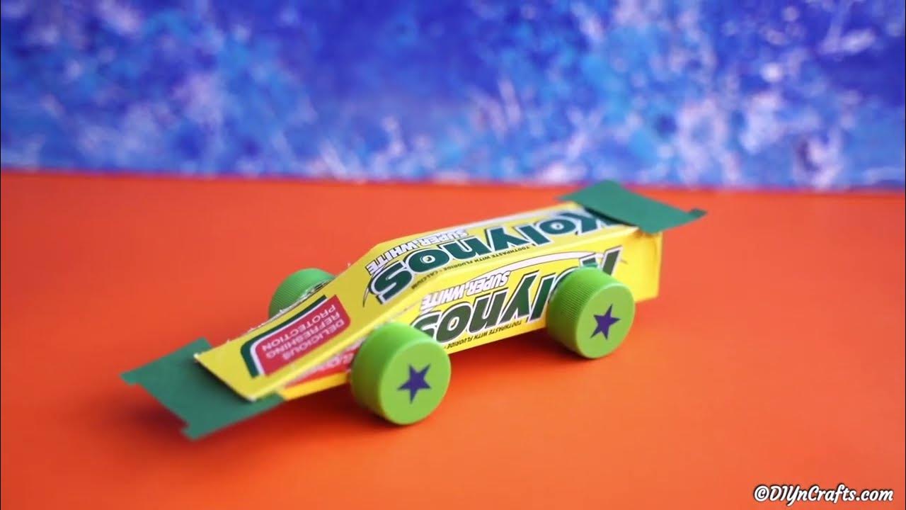 Upcycle a toothpaste box! Fun race car made for kids to play with