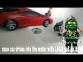 race car drives into the water with LEGO doll on it