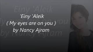 Nancy ajram einy alik song with english translation and Arabic lyrics Resimi
