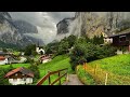 Lauterbrunnen switzerland  rainy walk in the most beautiful swiss village  fairytale village