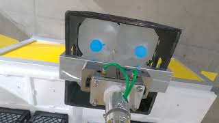 FANUC SR-20iA SCARA Robot picks and places crates of water jugs