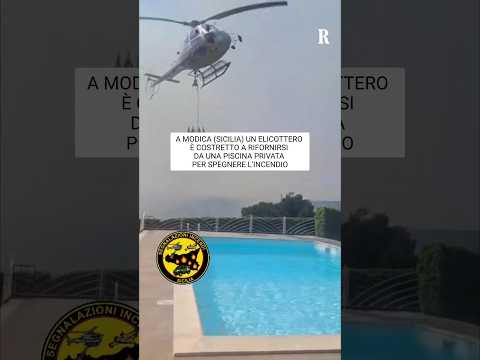 Video La Sicilia brucia, a Modica un elicottero costretto a rifornirsi da una piscina