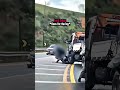 Road Raging Biker Throws Rock At Truck Driver