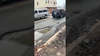 See some of the massive potholes in Providence's West End