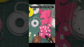 Watch me layer this simple birthday 3D cake topper! #cricut #cakedecorating #papercraft #caketopper