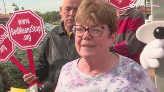 Group protests end of red light camera program in Phoenix