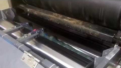 UV coating on Adast Dominent offset printing machine