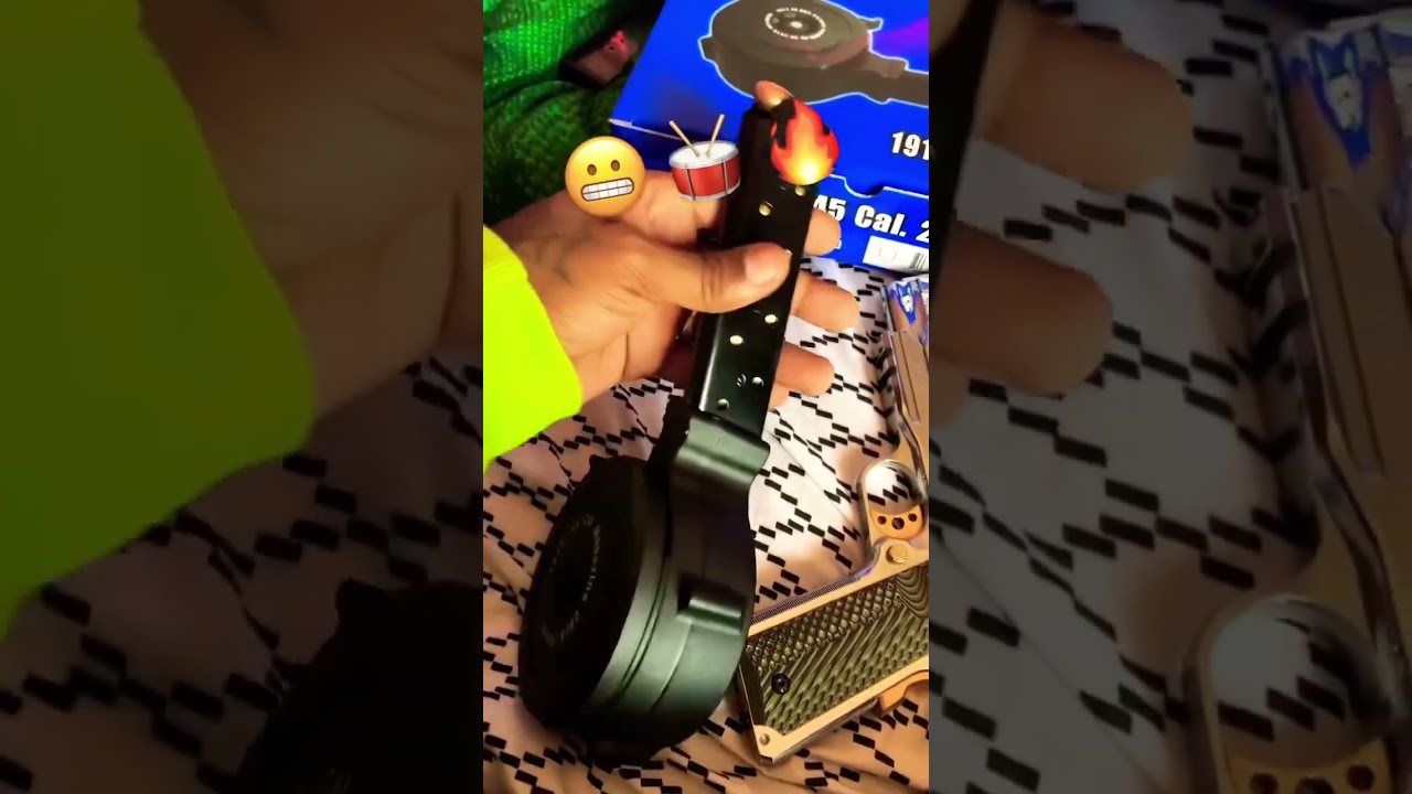 1911 with a 28 round  drum 😳 