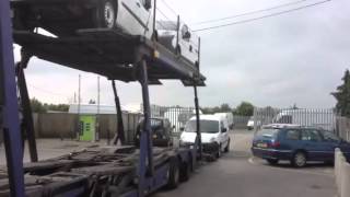 Unloading a vehicle transporter