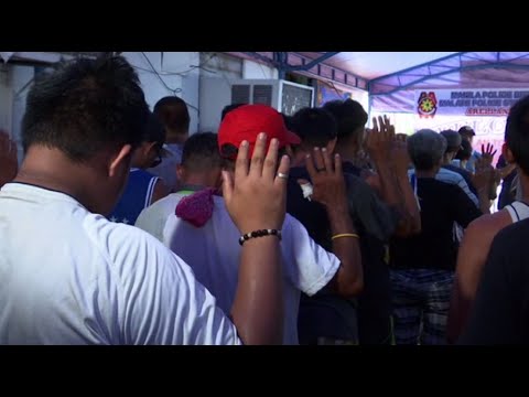 Drug users, dealers in Manila surrender to police