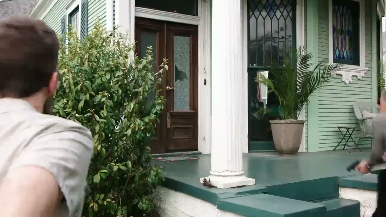 NCIS New Orleans: Pride and the Team raids a house.