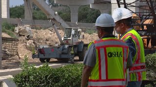 TXDOT reviewing safety measures after two construction workers were hospitalized in accident along 1