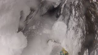 Snowboard Accident  Snowboarder falls into a rock crevice