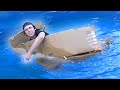 Trying to Float in a Cardboard Boat