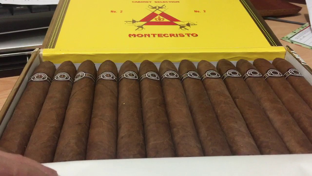 Opening a box of Montecristo No.2 Cuban Cigars