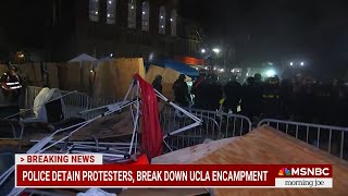 BREAKING : Police detain protestors and break down an encampment on UCLA&#39;s campus.