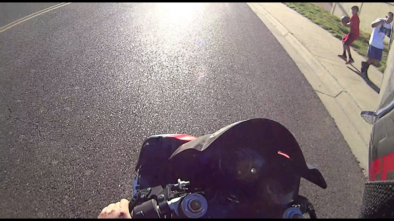 Kid wants to throw ball at bikers YouTube